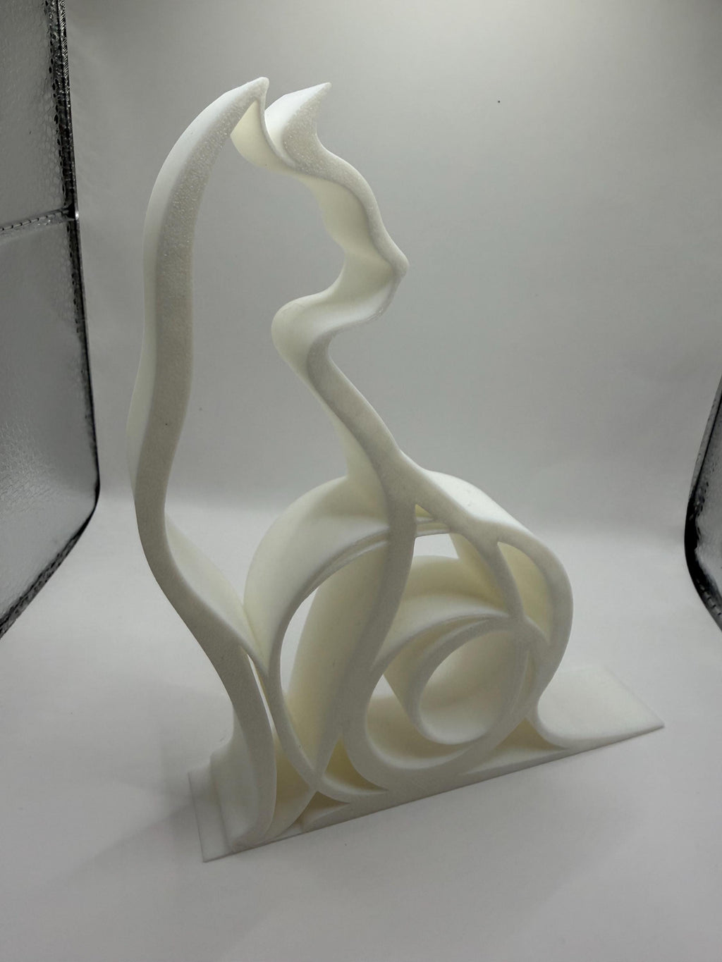 3D Printed Sleek Curved Cat Sculpture