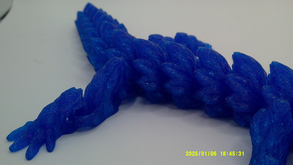 Articulated 3D‑Printed Blue Crystal Dragon