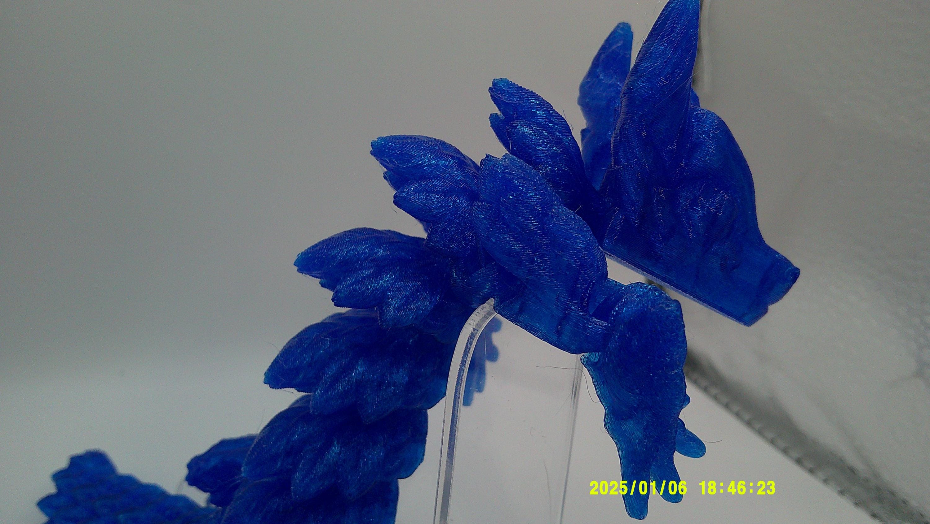 Articulated 3D‑Printed Blue Crystal Dragon