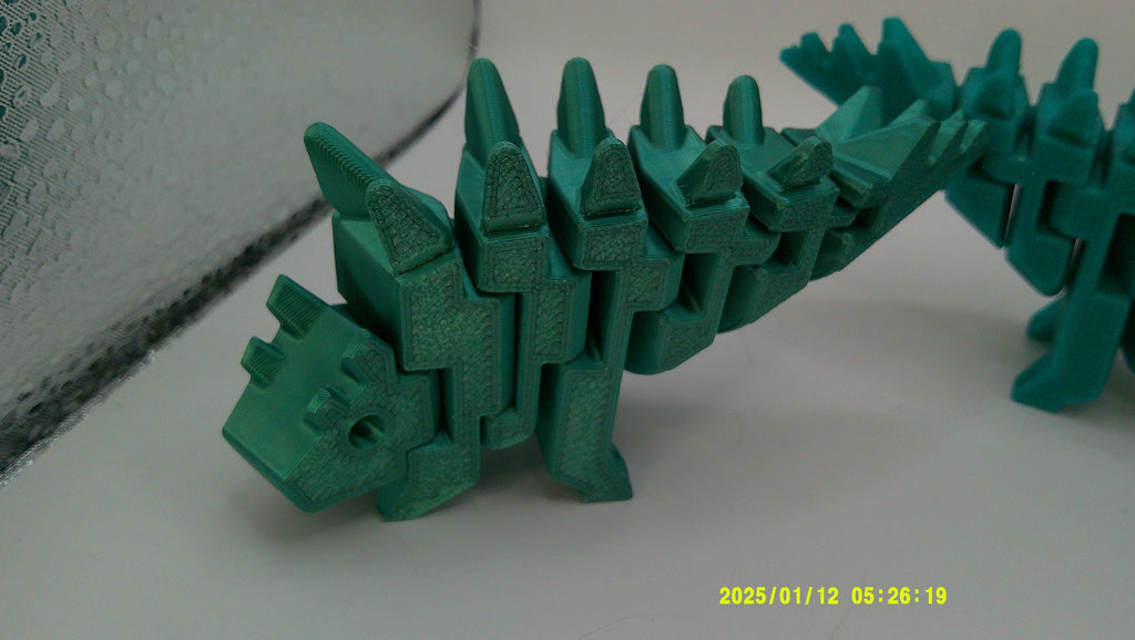 Flexi Stego Riding Buddy, 3D Printed Dinosaur Bike Companion