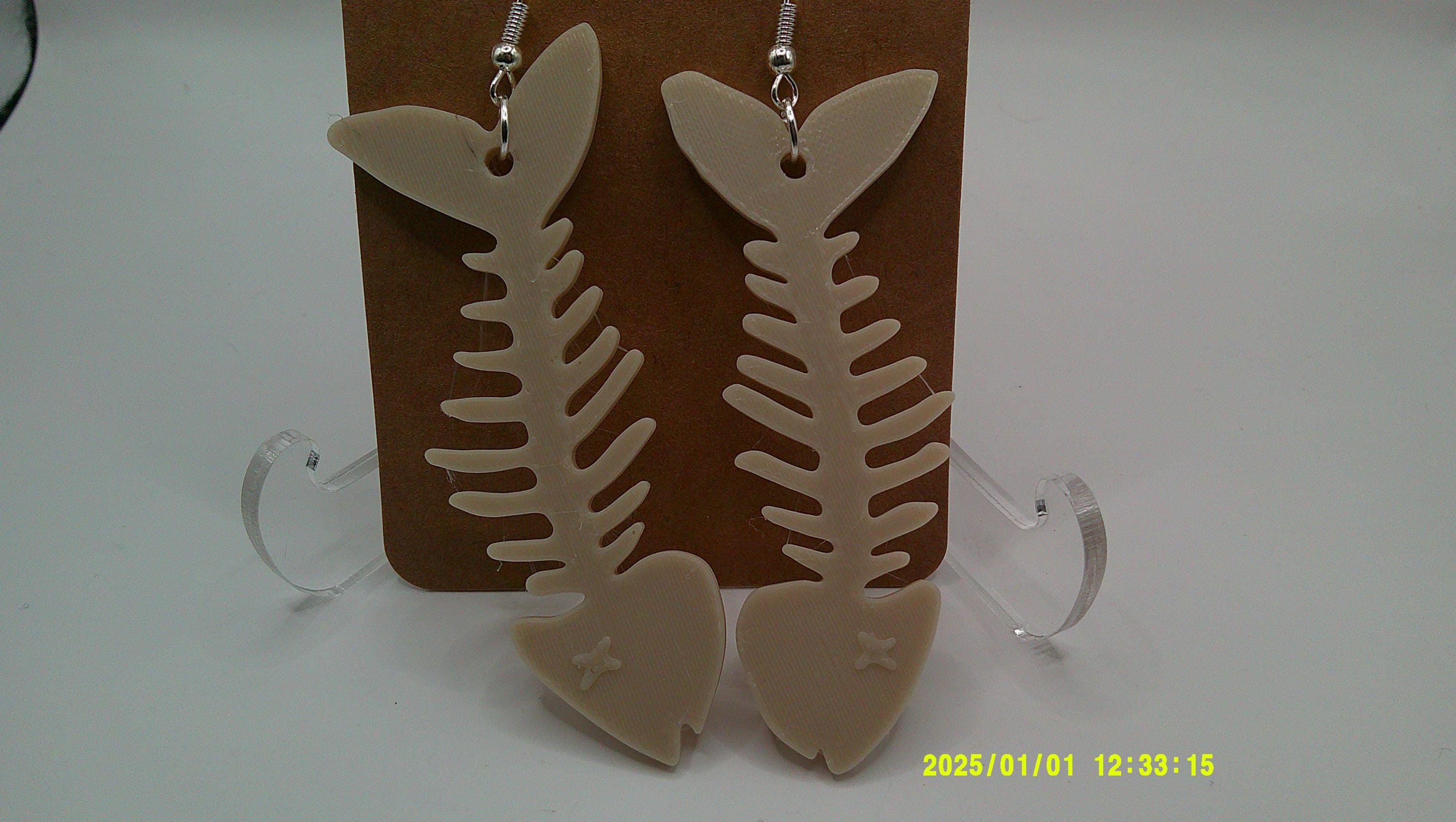 Catch & Release Earrings – Playful Fishbone Drop Pair